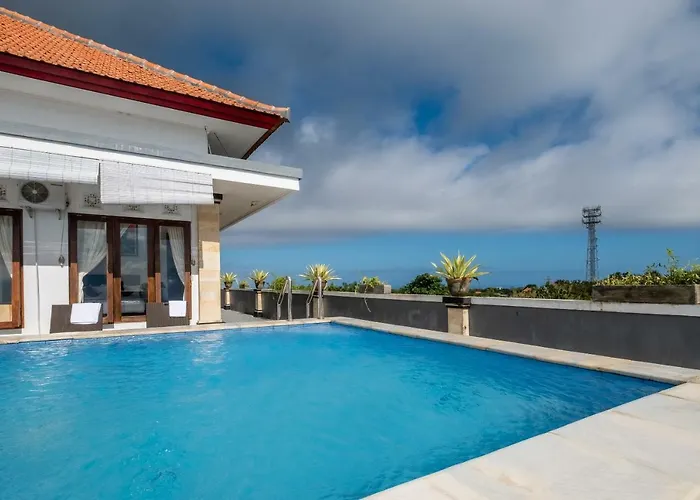 Reddoorz Plus Near Dreamland Beach