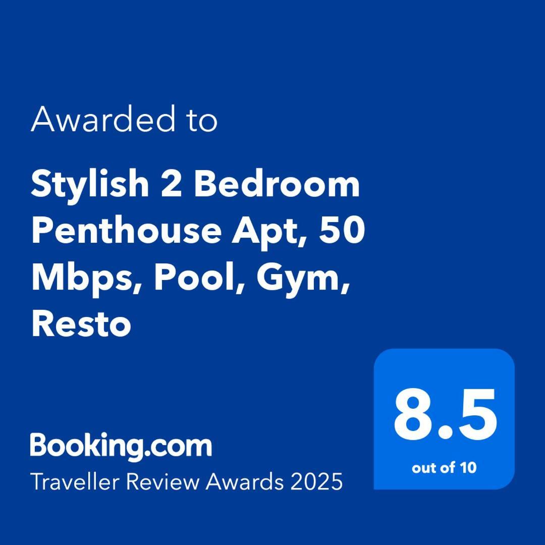 Stylish 2 Bedroom Penthouse Apt, Newly Refreshed, 50 Mbps, Pool, Gym, Resto Apartment