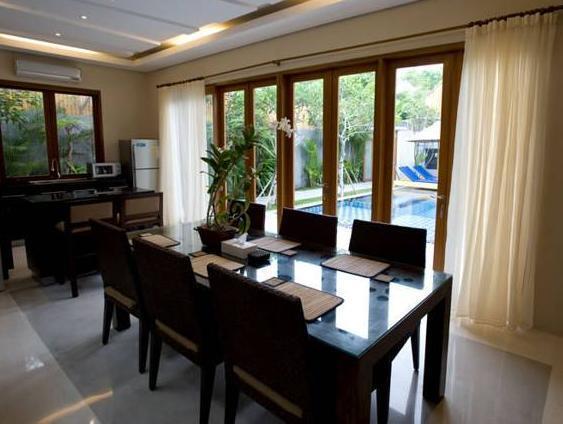 Travis Villa *