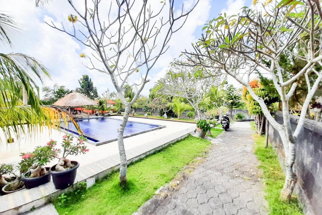 Bhujangga's Village Near Pantai Redpartner Guest house *