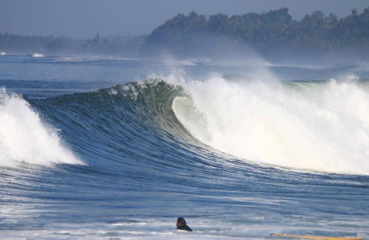Surfers And Medewi Resort