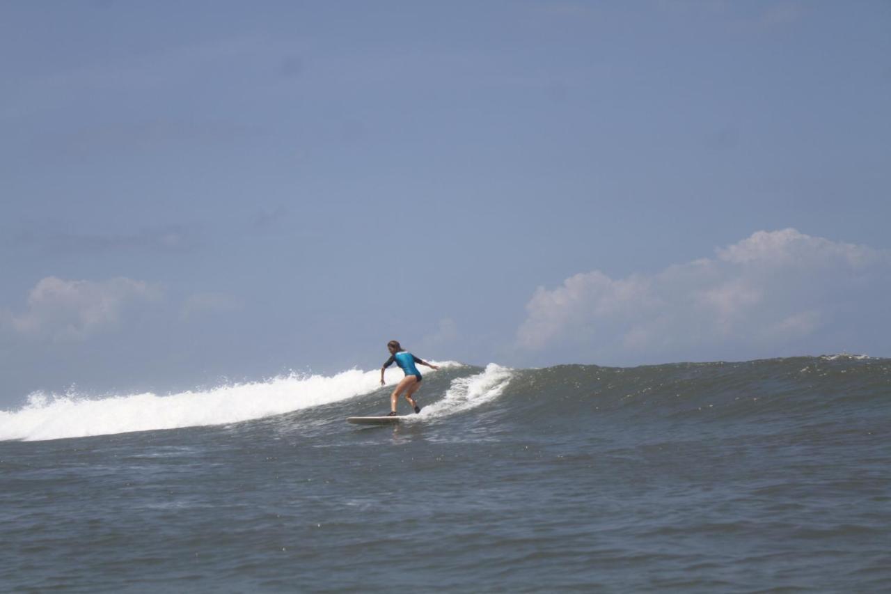 Resort Surfers And Medewi