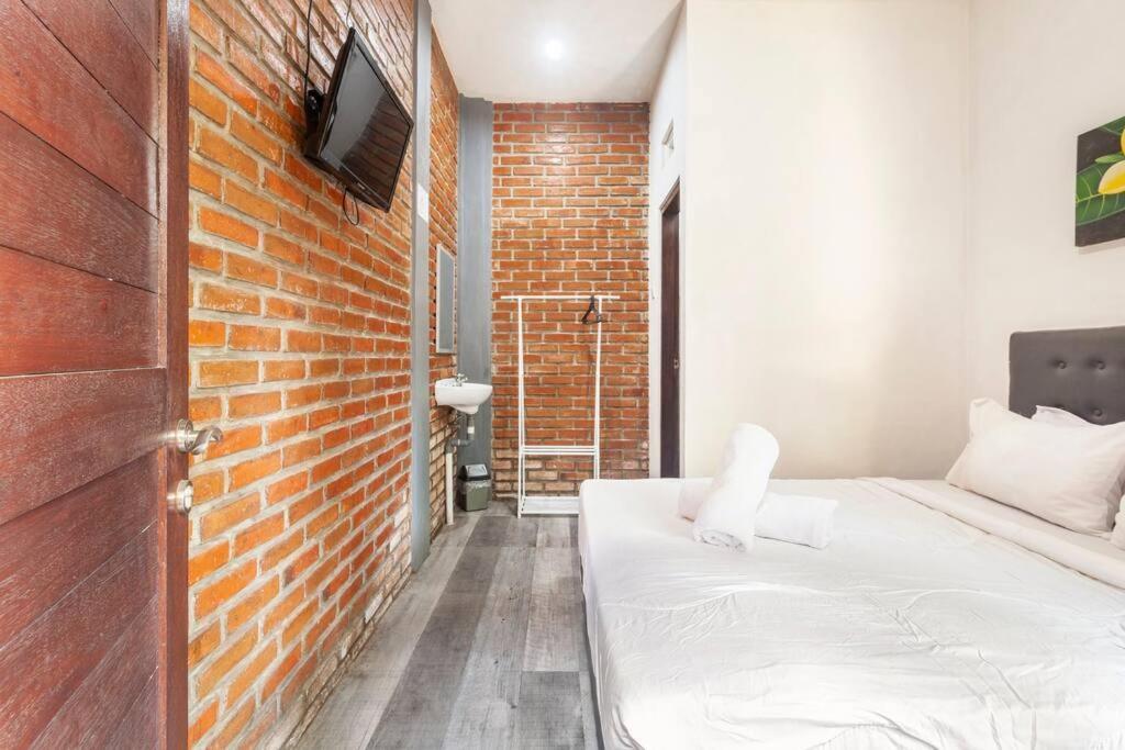 Wisma tamu The Backyard House *