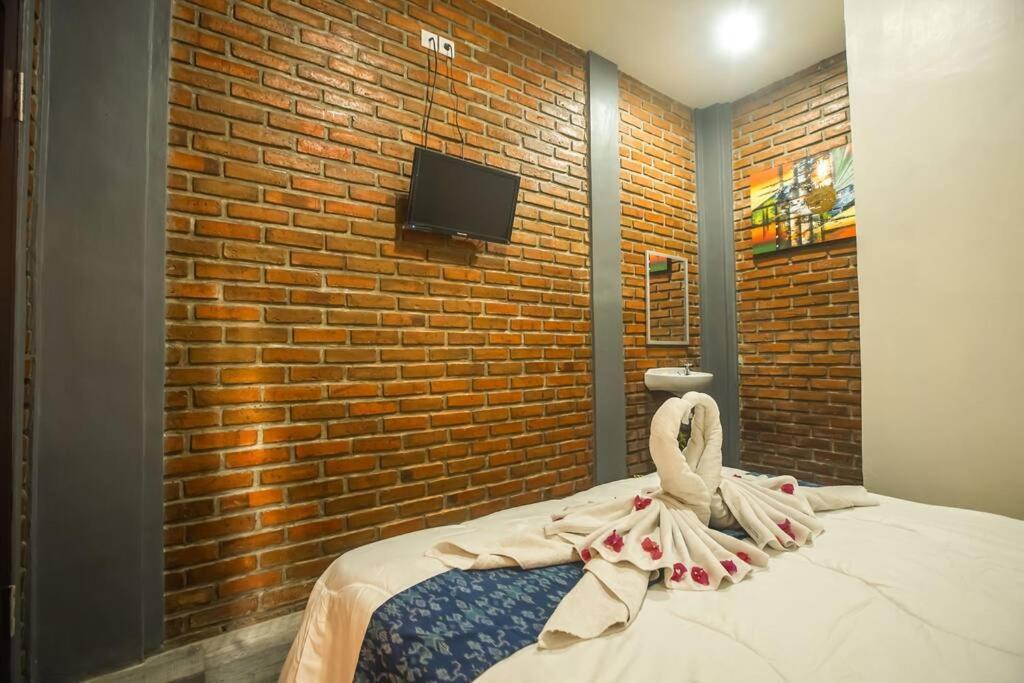 Wisma tamu The Backyard House *