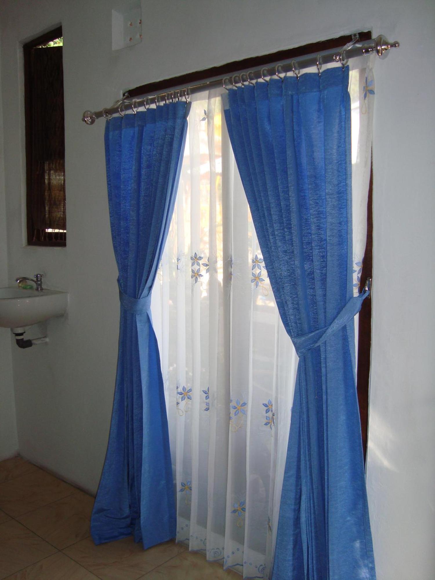 Taman Ayu Mitra Reddoorz Homestay