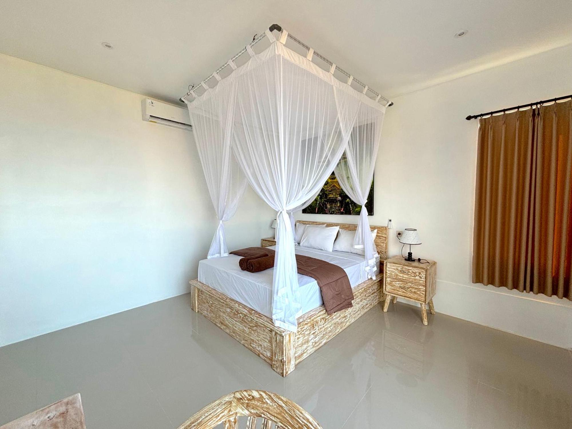 Raweg Wisma tamu Amed (Bali)