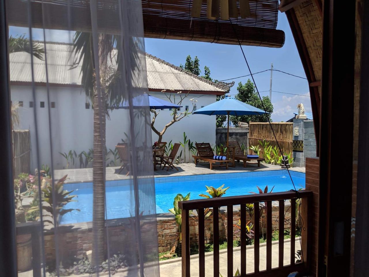 Q Rimbuk Bungalow Taman liburan
