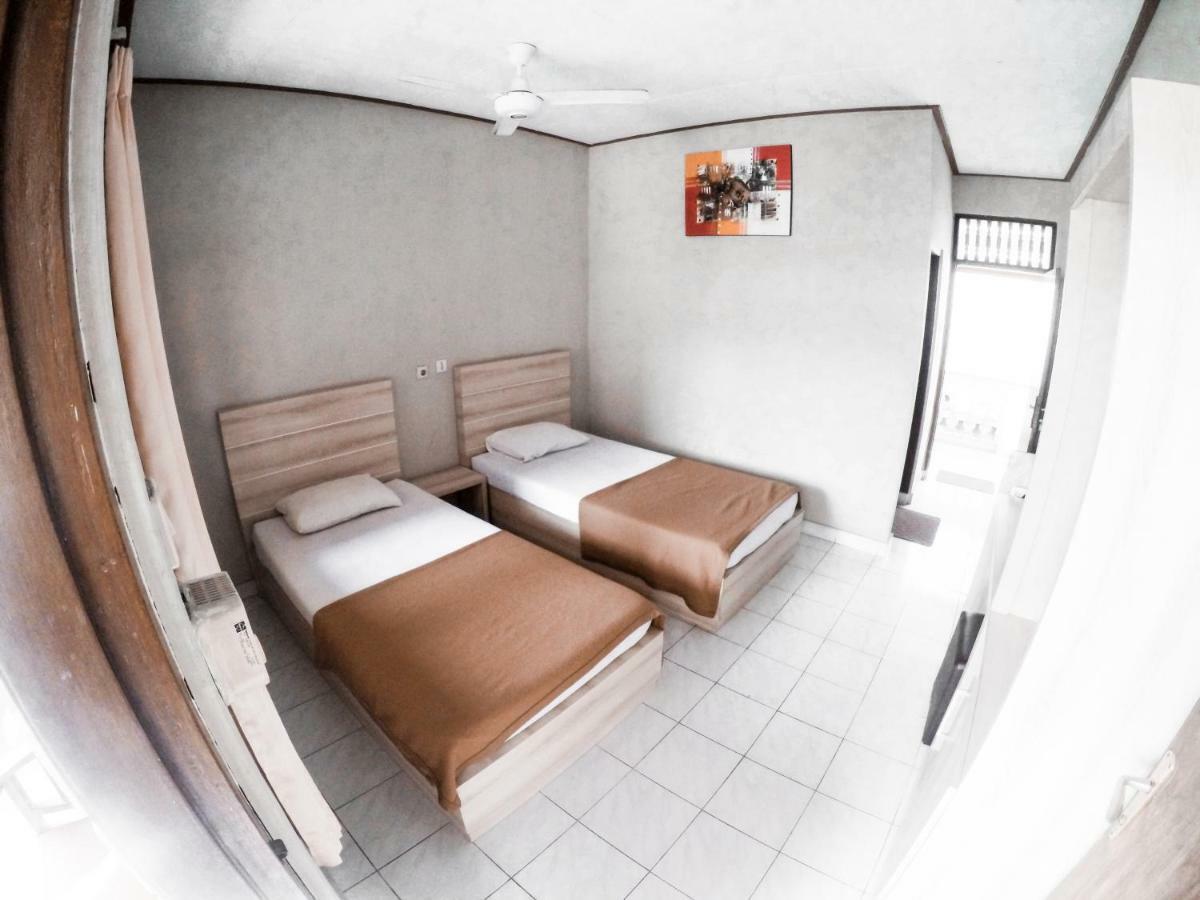 Palm Garden Kuta Guest house *