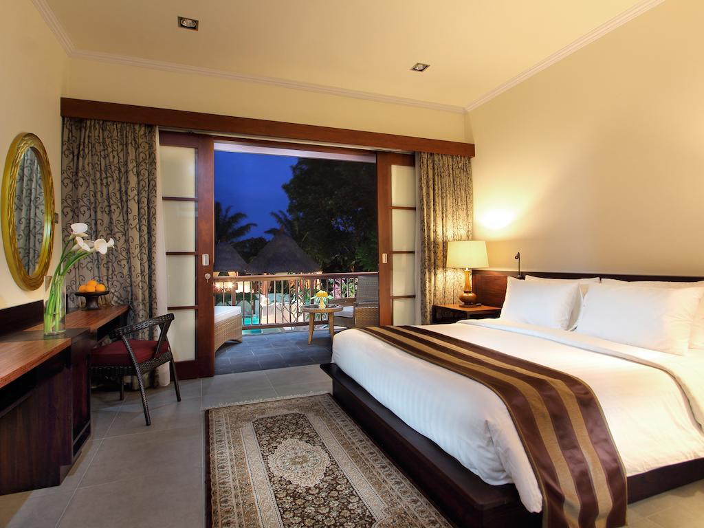Hotel Griya Santrian A Beach 4*