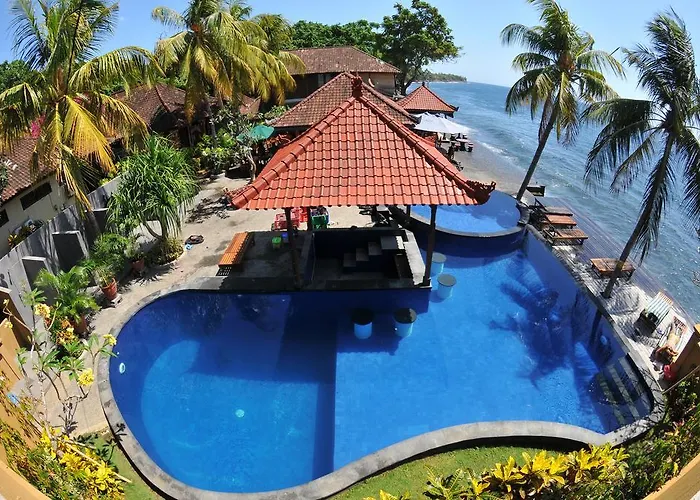 Paradise Palm Beach Bungalows And Dive Center