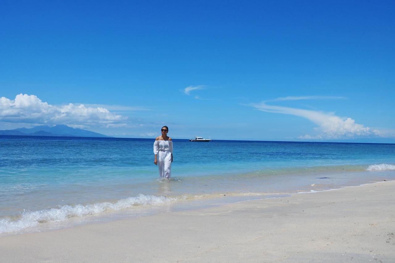 Hotel Blue Harbor Beachfront & Resto Toyapakeh