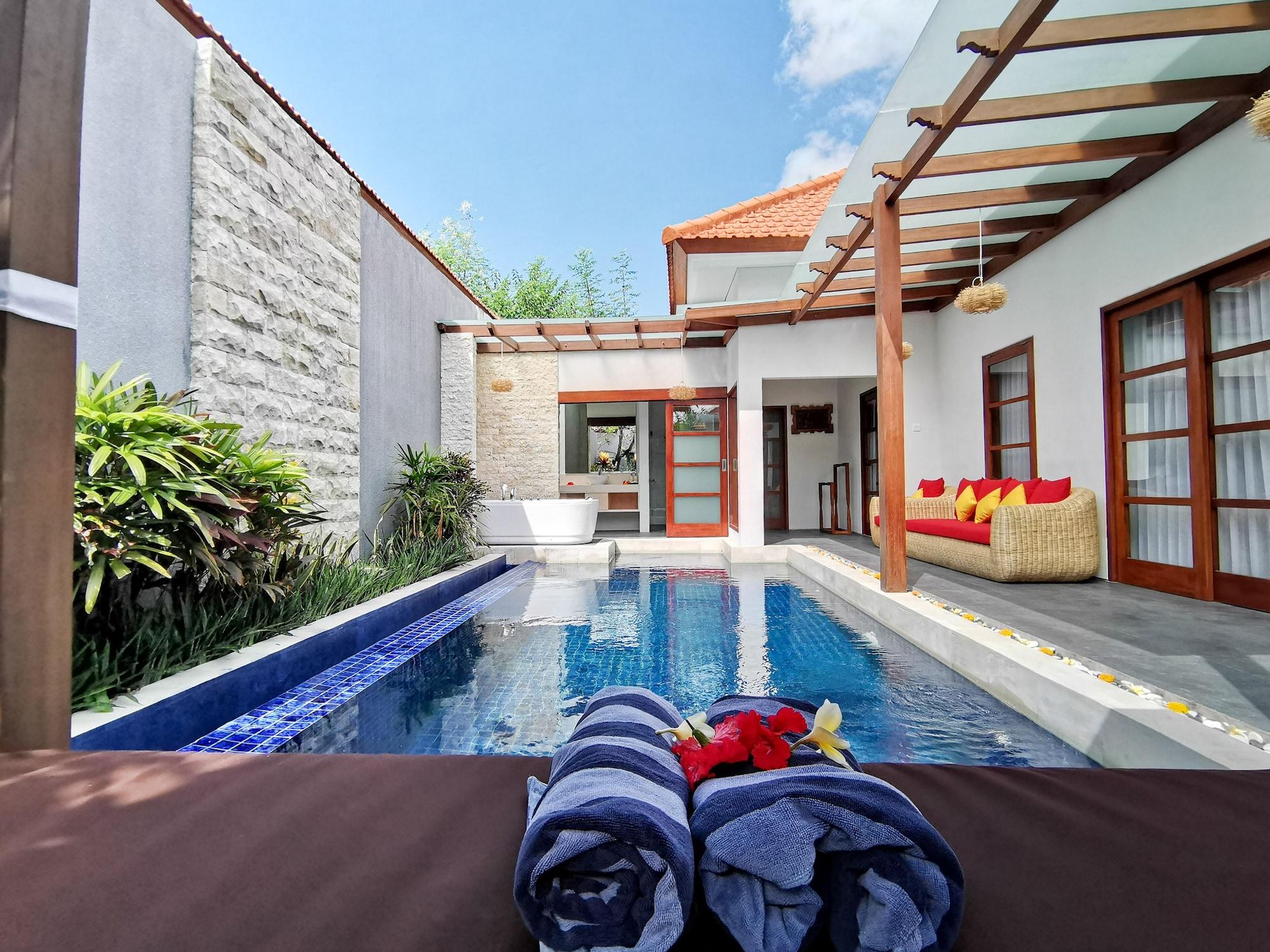 Kuta Puri Bungalows, And