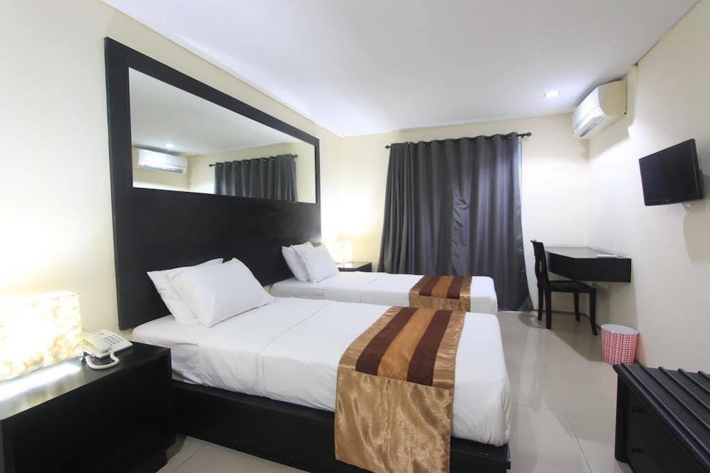 Airport Kuta And Residences Hotel